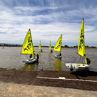 A group of boats being launched.