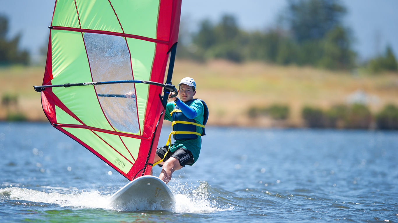 A boy wind surfing