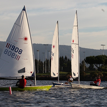 Laser boats on shoreline lake