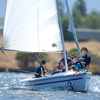 A group of boys sailing
